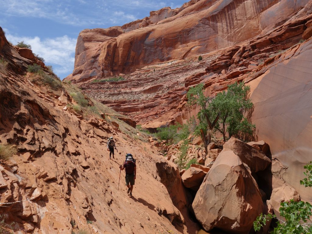 hikers in Coyote Gulch